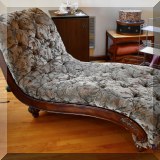 F80. Rolled back tufted chaise longue.